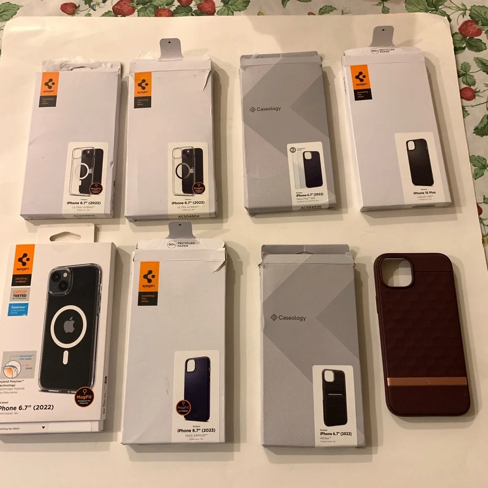 9 Assorted Spigen & Caseology iPhone 14 Plus and iPhone 15 Plus